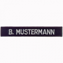 Namenband in Baumwollqualität<br> 25mm breit<br>Länge nach Wahl<br>Schwarz oder marine - nach Wahl<br>Namenband Baumwolle, mit Klett, mit Kettelrand<br><br>